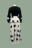 Side view showing the flattering high-waist fit of the polka dot long dress