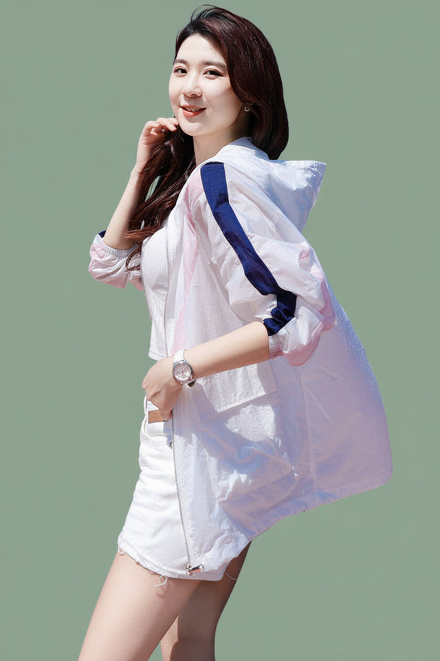 Back view of a lavender lightweight hooded sun protection shirt for outdoor activities