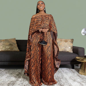 Back view of the longline African tunic top paired with comfortable high-waisted pants.