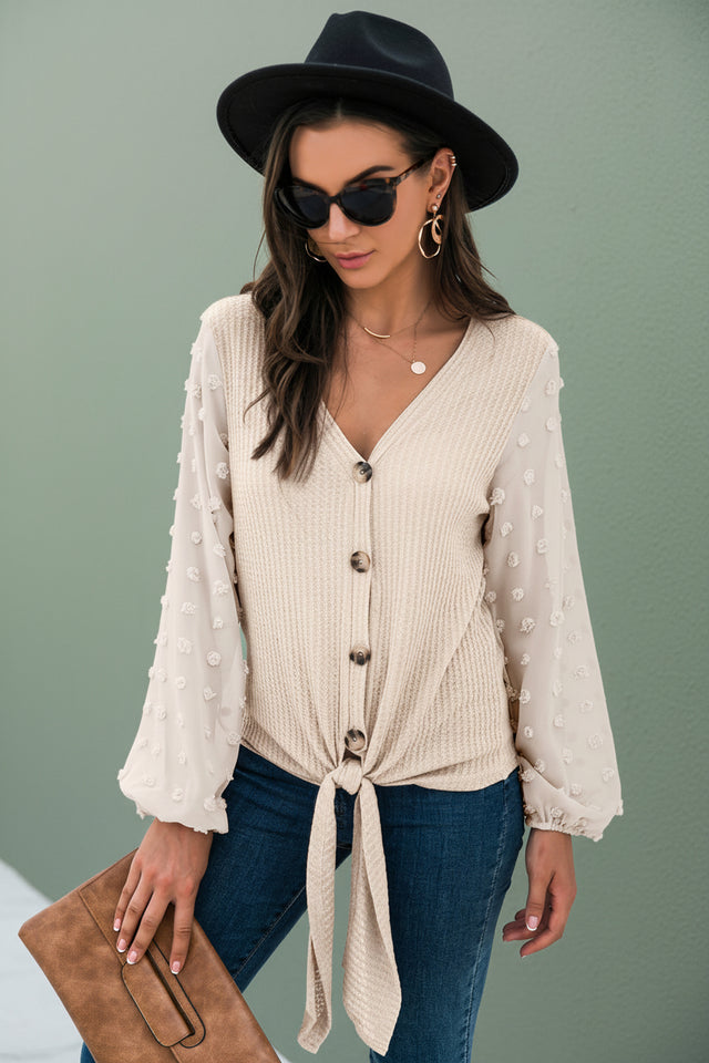 Back view of stylish black long sleeve V-neck fall cardigan