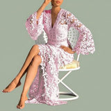 Back view of a flowing blue African pattern maxi dress with a comfortable fit.